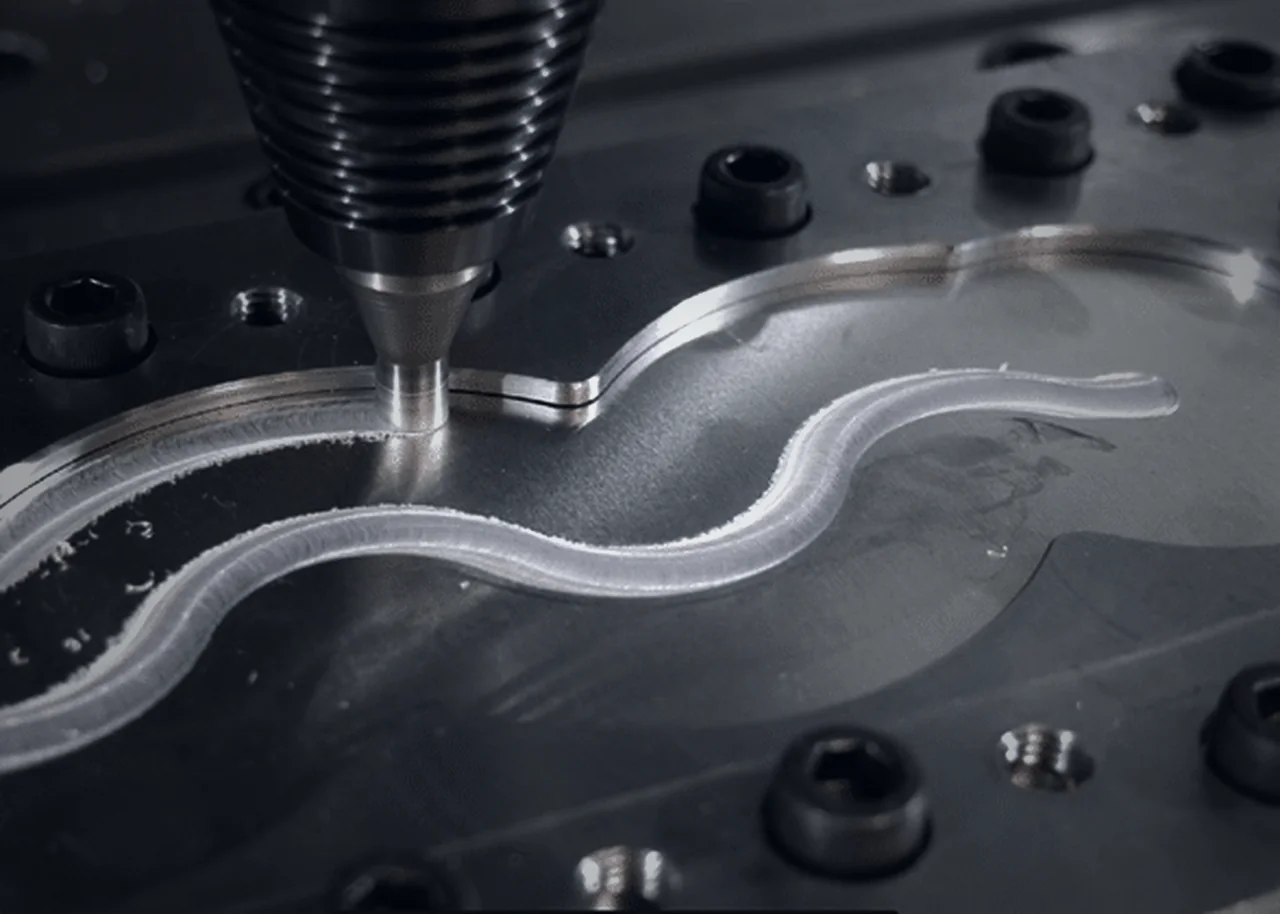 CNC machining a copper cold plate inside a climate-controlled cell