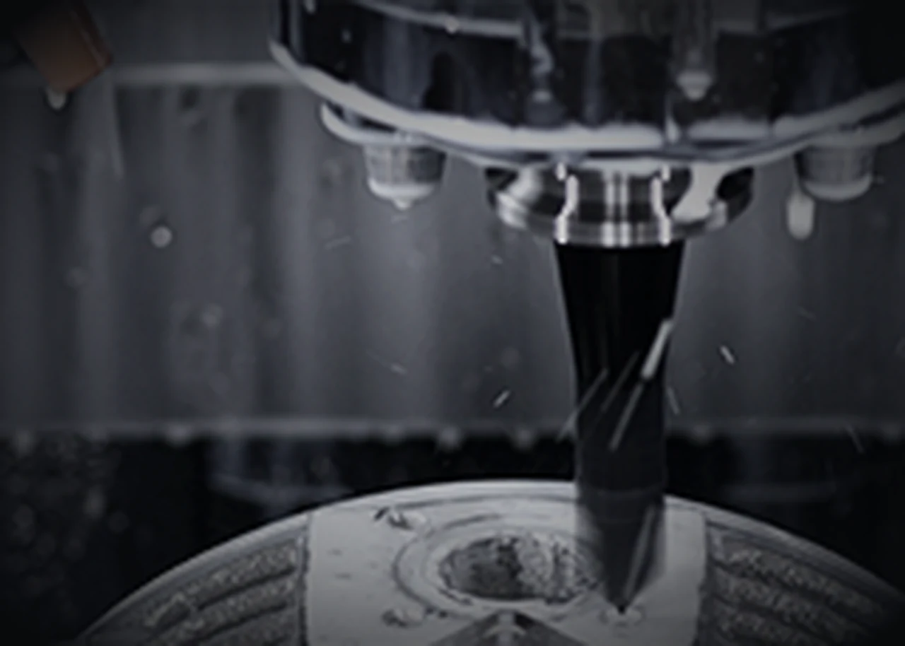 5-axis CNC finish-machining of an aluminum drive-unit housing in a sealed cell