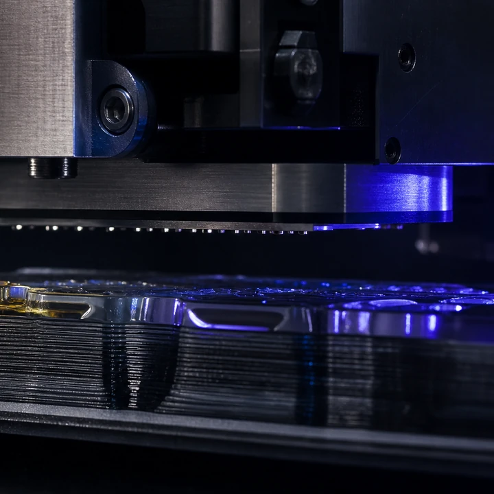 PolyJet process — cinematic studio shot